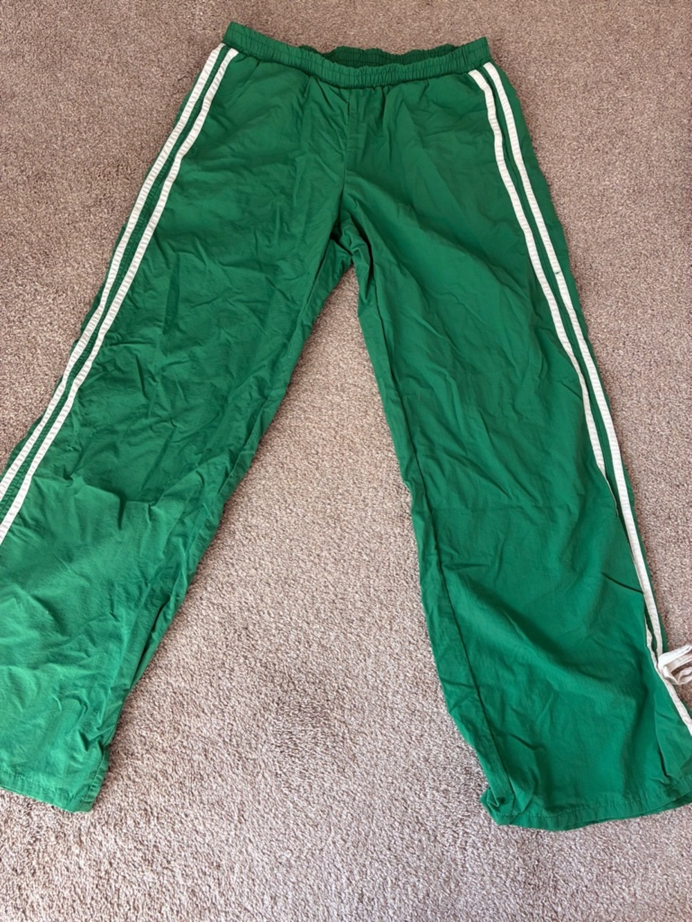 Green Track Pants with White Side Stripes